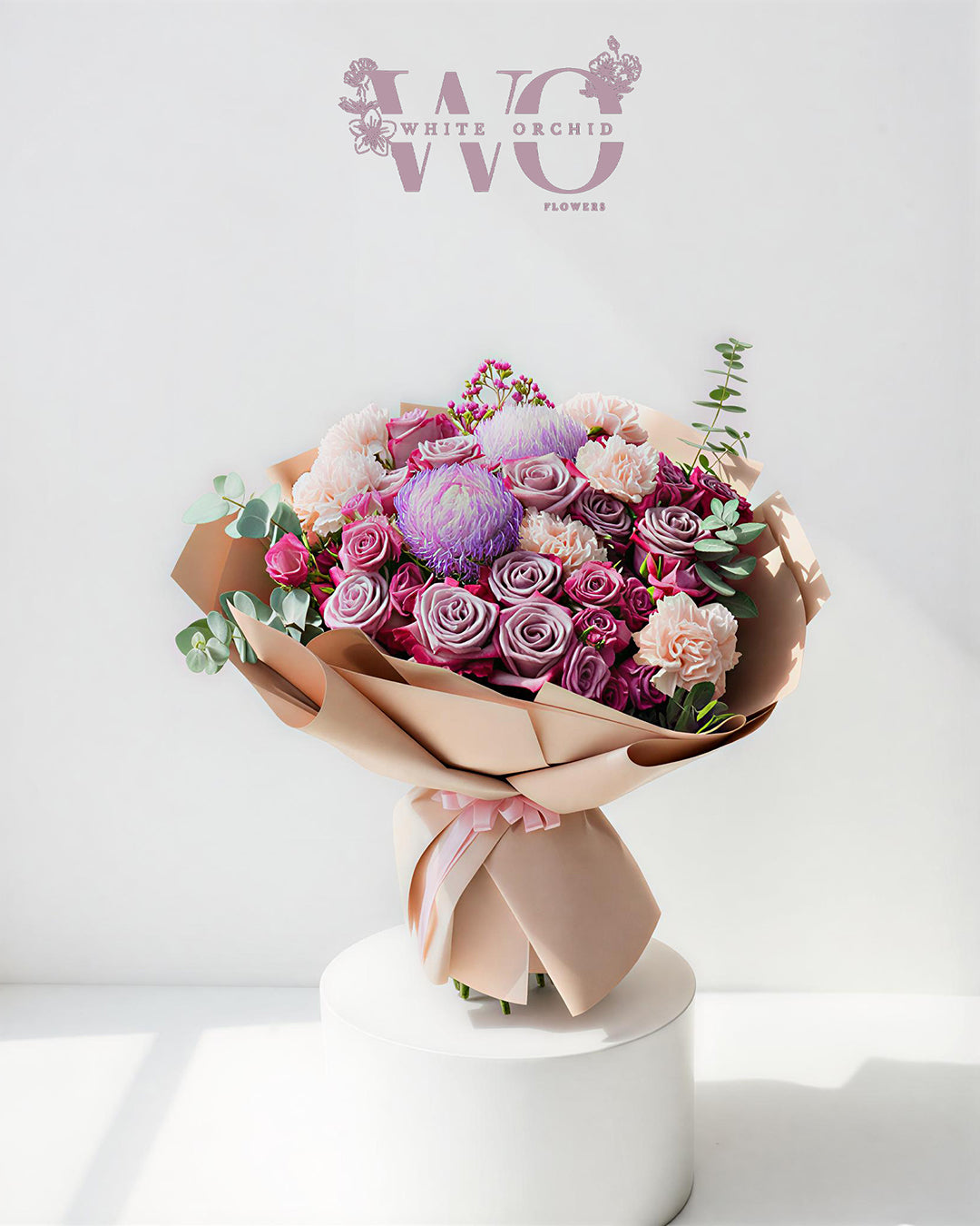 Luxury hand bouquet with fresh natural flowers by White Orchid Flowers – hand-tied floral arrangement with UAE delivery.