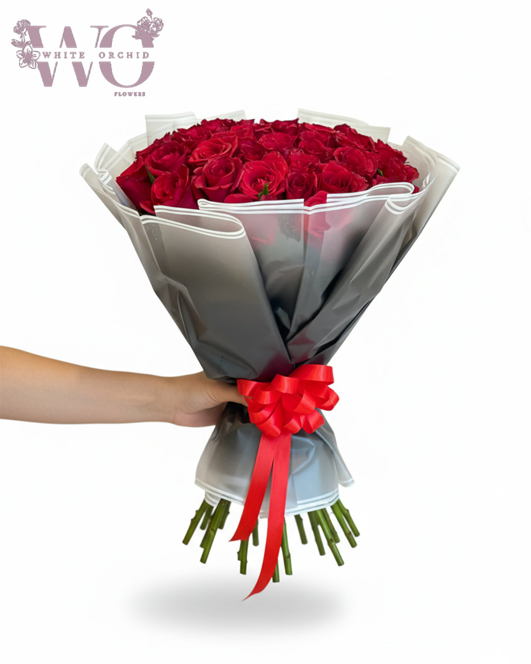 Red rose bouquet made with premium natural roses by White Orchid Flowers – elegant fresh bouquet with delivery across all UAE.
