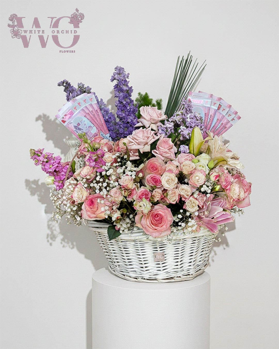 Pink Flower Arrangement 
Elegant. Romantic. Designed by White Orchid Flowers