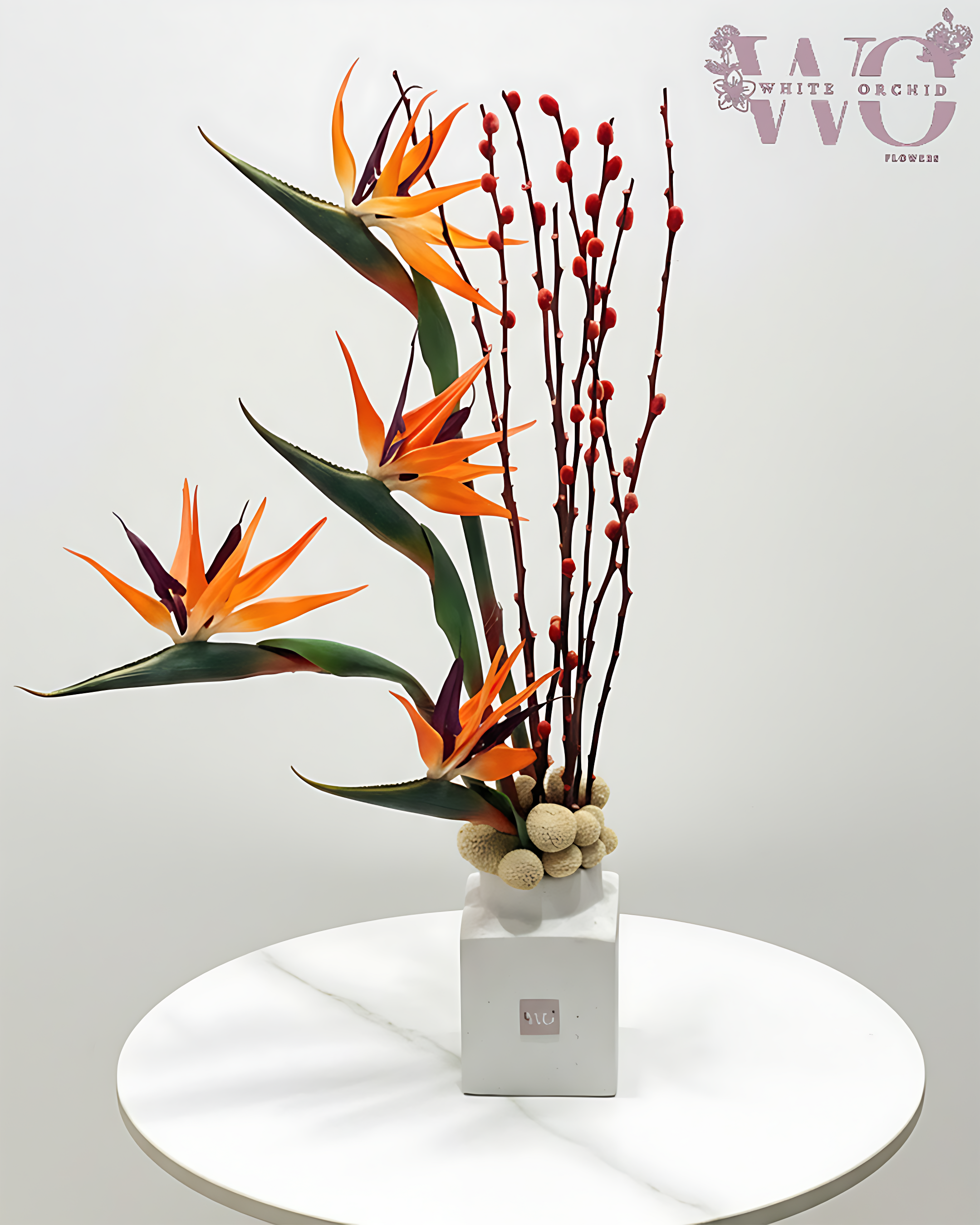 Bird of Paradise & Cylix Arrangement Exotic. Elegant. Designed by White Orchid Flowers.
