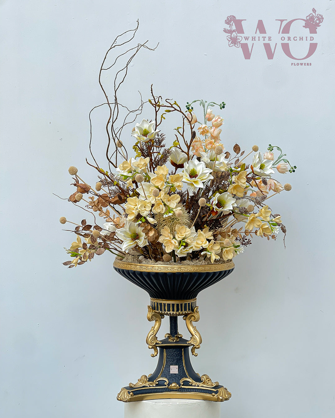 Artificial flower arrangement by White Orchid Flowers – elegant long-lasting floral design with delivery across all UAE.