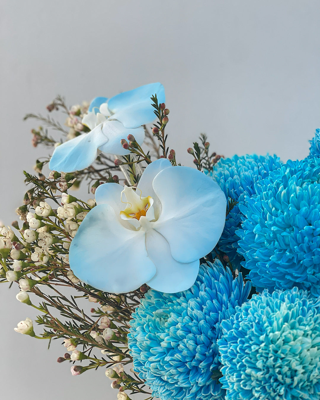 New Baby Boy Flower Arrangement – White Orchid Flowers