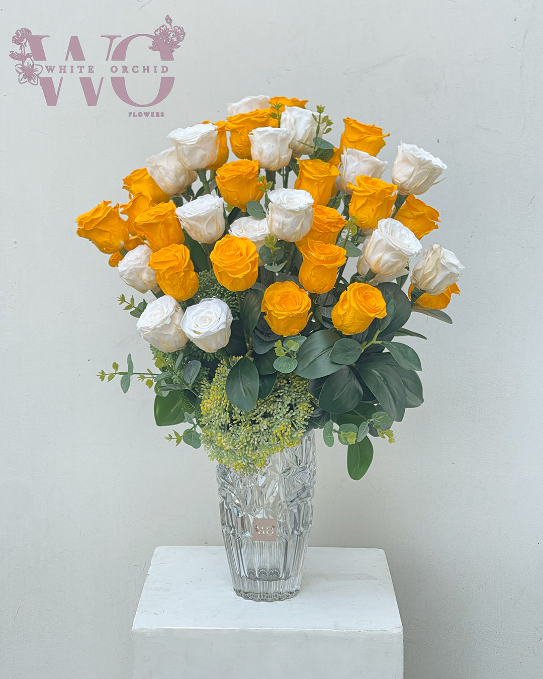 Yellow and white forever rose bouquet by White Orchid Flowers – elegant long-lasting floral arrangement with delivery across all UAE.
