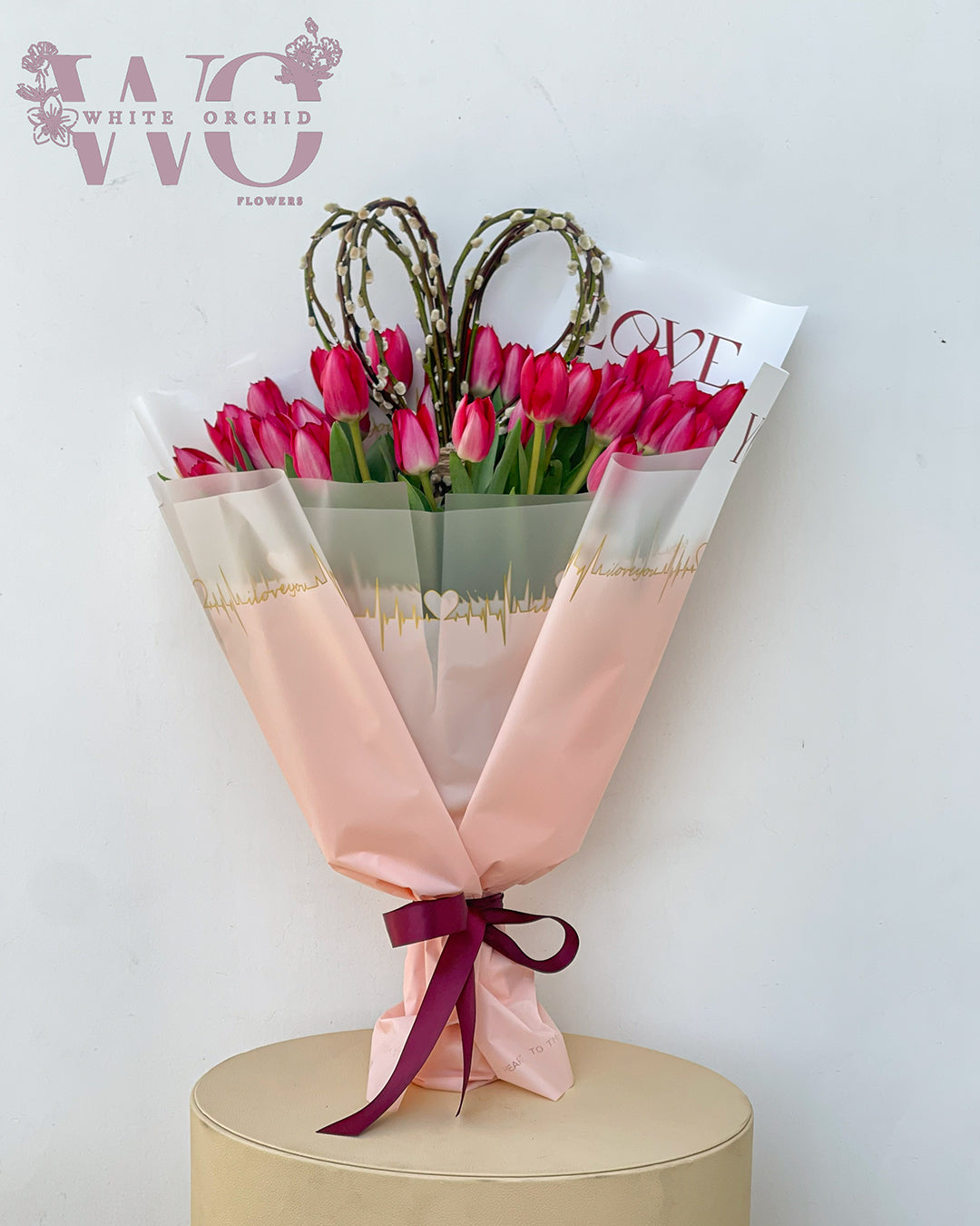 Tulip hand bouquet made with natural fresh tulips by White Orchid Flowers – elegant floral gift with delivery across all UAE.