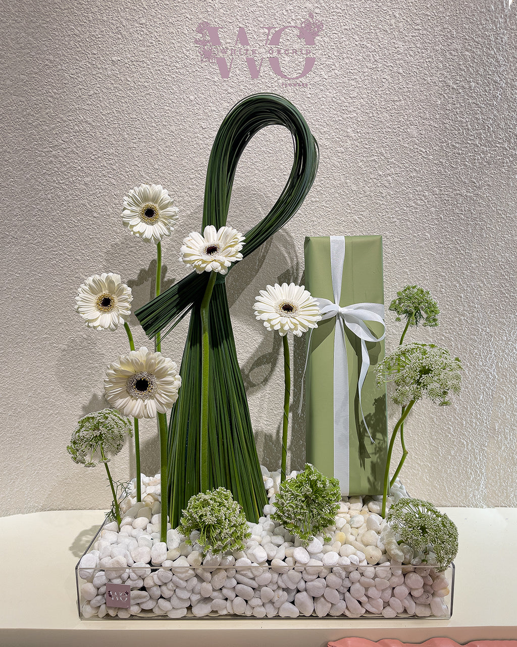 Acrylic box with fresh matthiola flowers by White Orchid Flowers – elegant floral gift with UAE delivery.