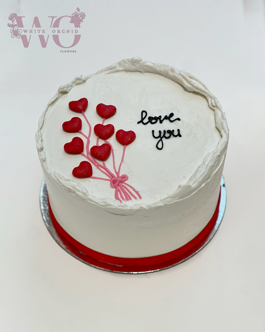 Premium cake by White Orchid Flowers, elegantly presented with delivery across all UAE.
