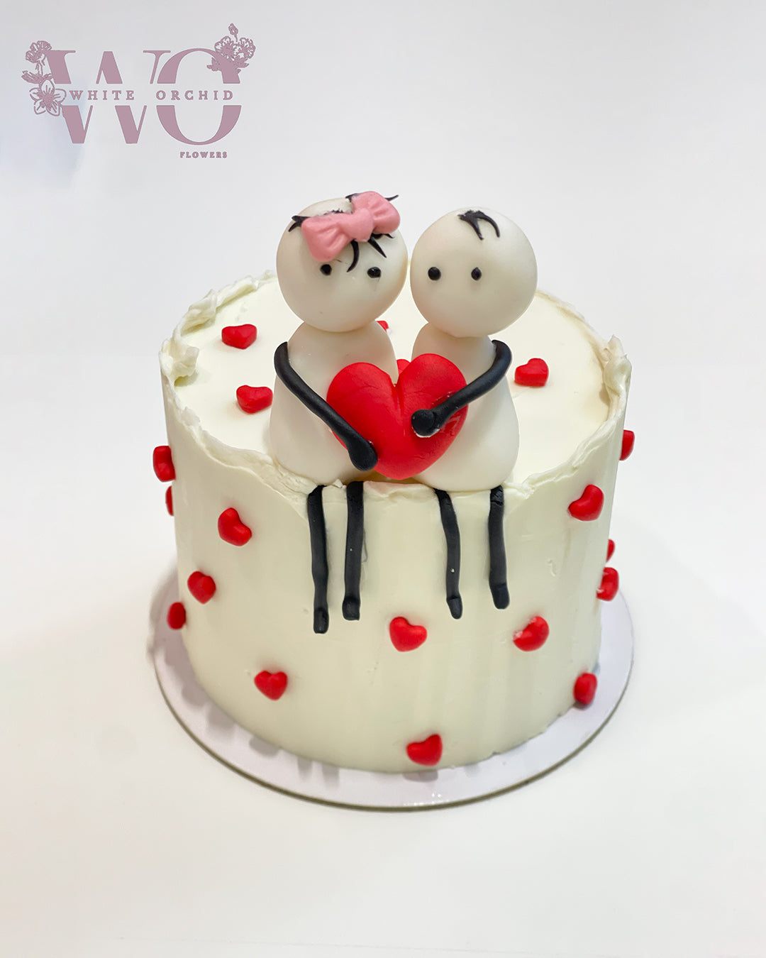 Premium cake by White Orchid Flowers, elegantly presented with delivery across all UAE.
