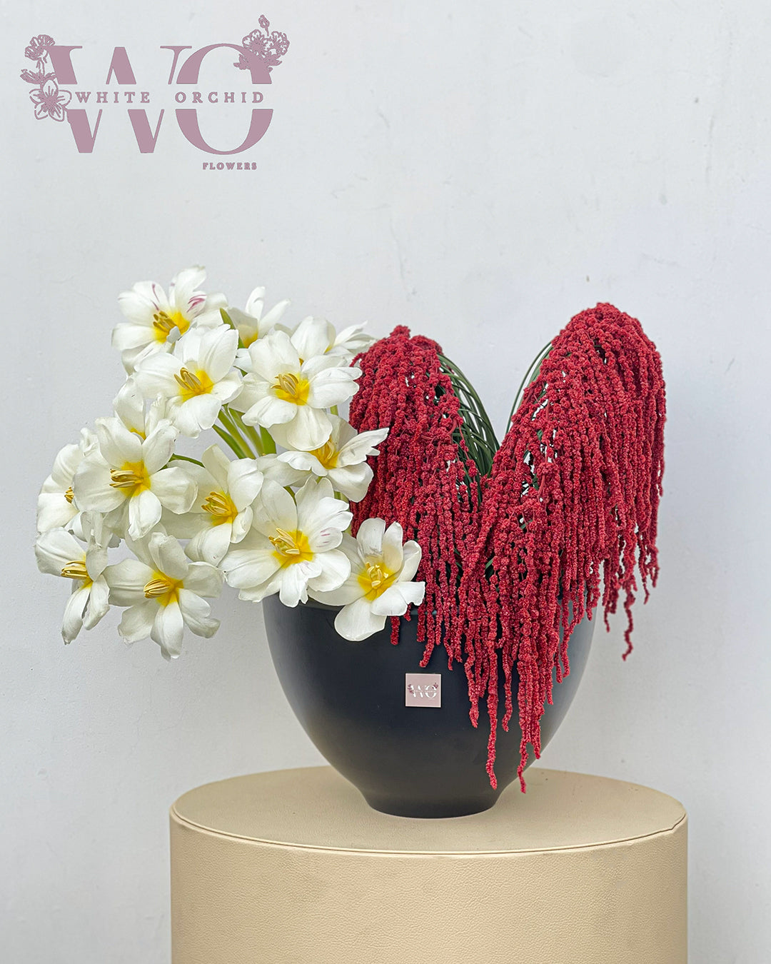 Valentine heart-shaped bouquet made with natural fresh white tulips by White Orchid Flowers – elegant romantic floral gift with delivery across all UAE.