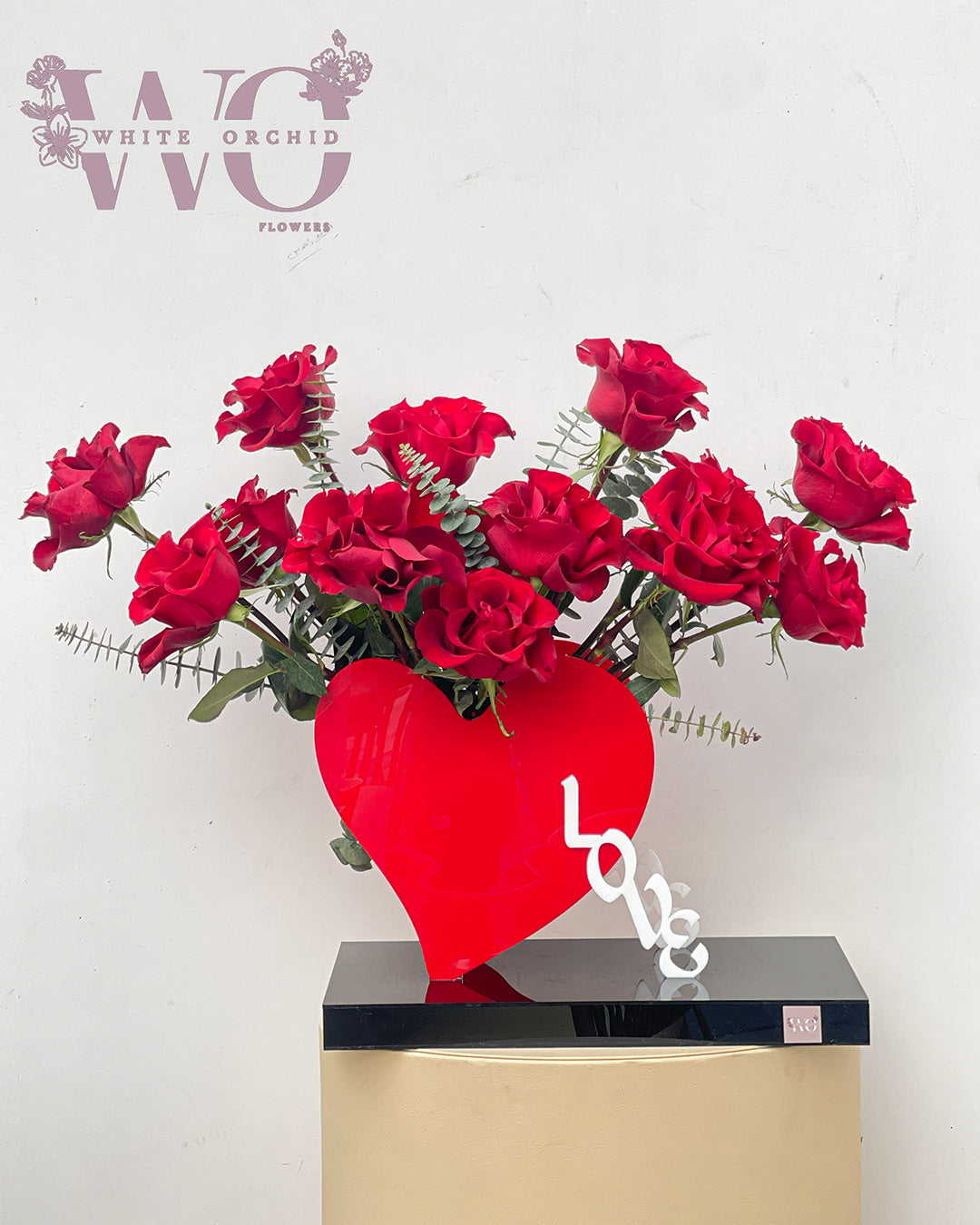 Valentine red rose arranged on a heart-shaped base by White Orchid Flowers – romantic floral gift with delivery across all UAE.