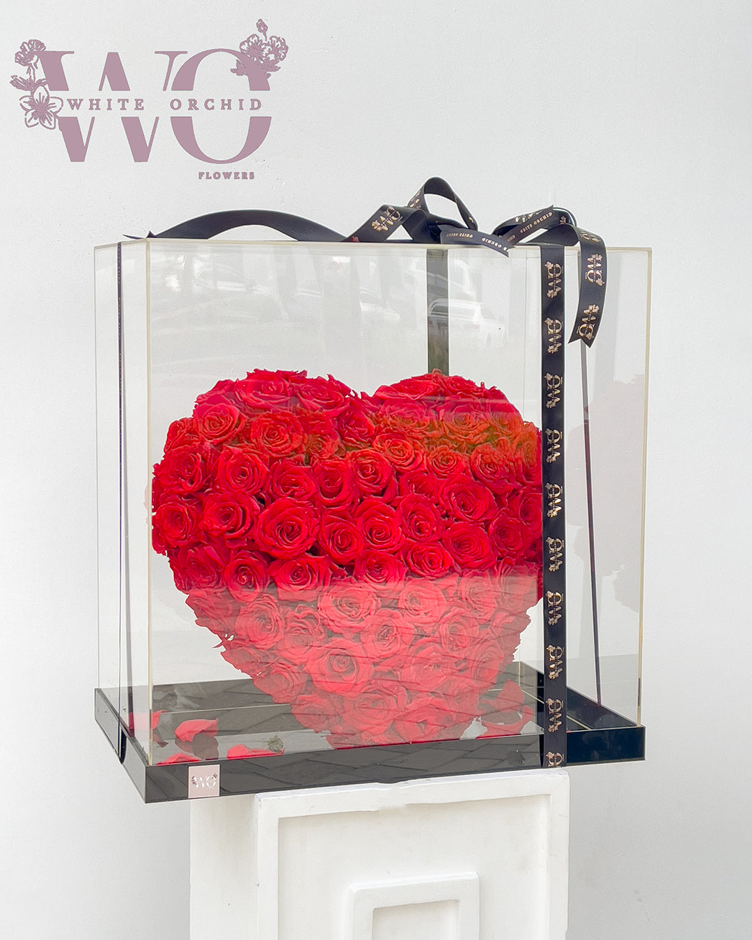 Forever rose heart arranged inside an acrylic box by White Orchid Flowers – preserved flower gift with delivery across all UAE.