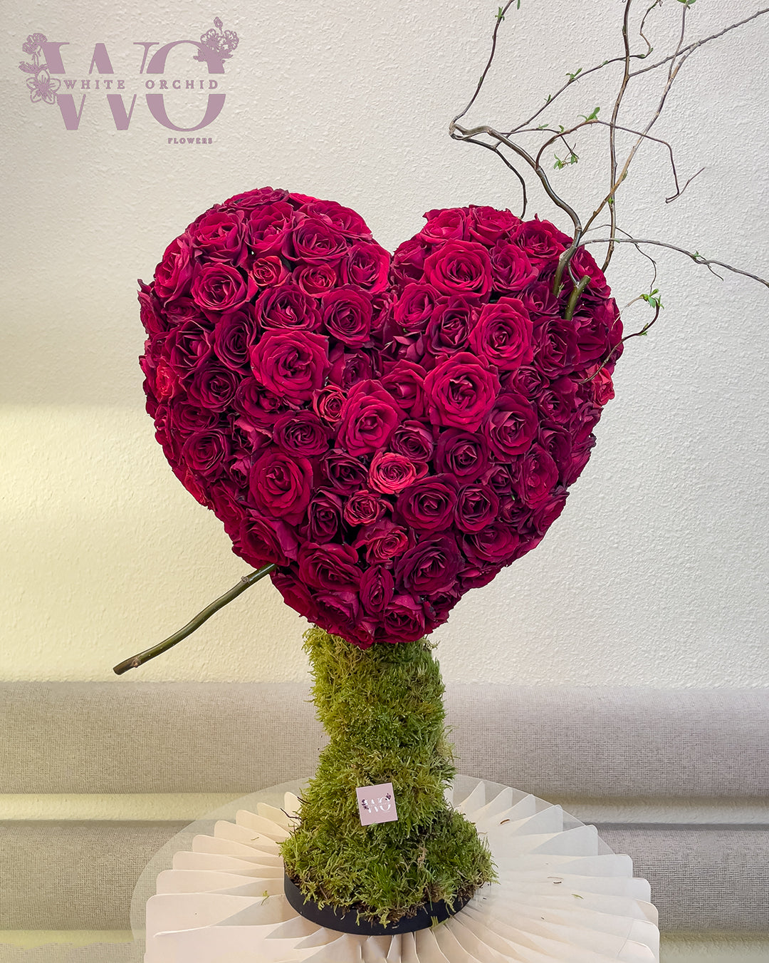 Valentine love heart-shaped flower bouquet made with natural fresh flowers by White Orchid Flowers – romantic floral gift with delivery across all UAE.