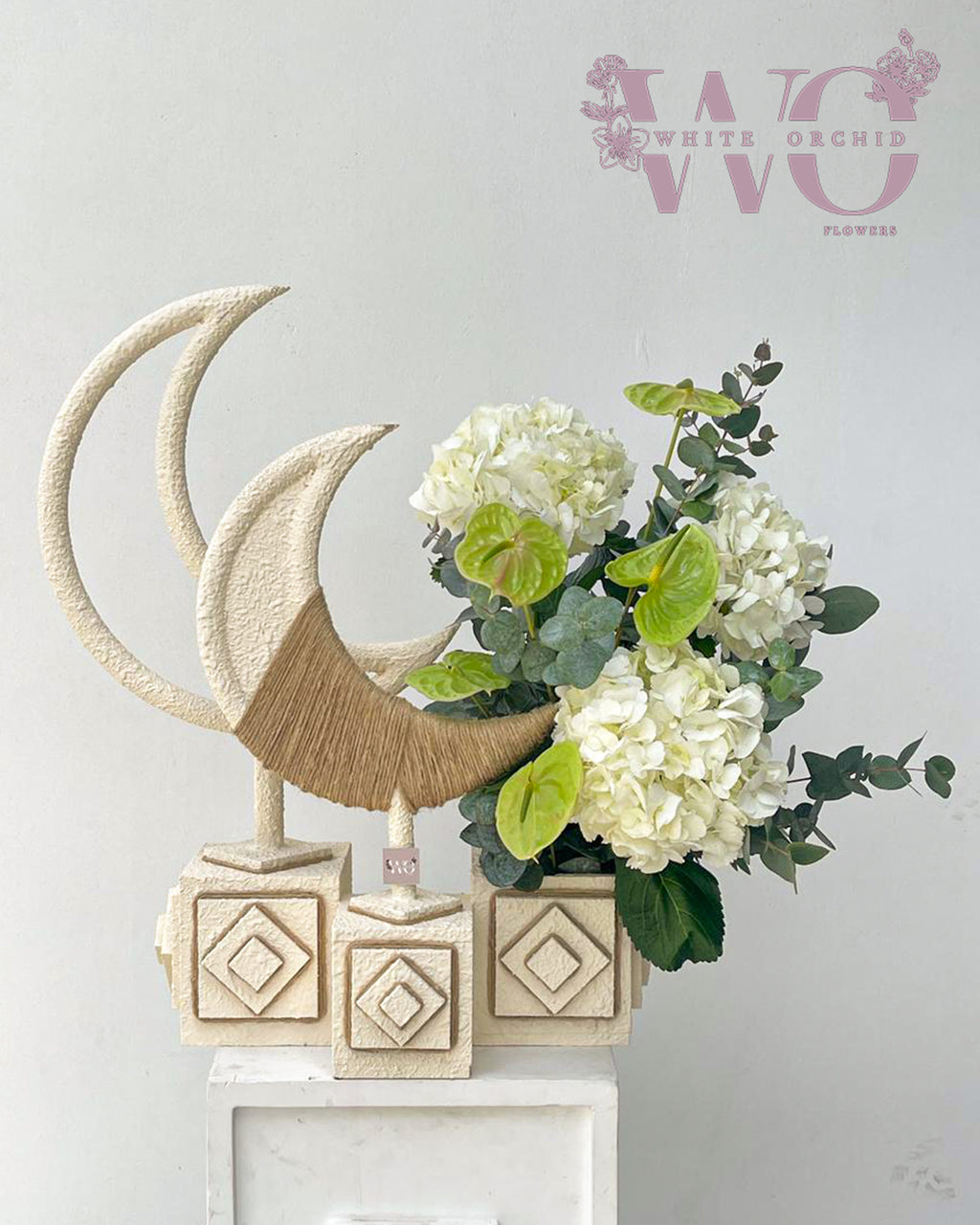 Ramadan flower arrangement made with natural fresh flowers by White Orchid Flowers with delivery across all UAE.
