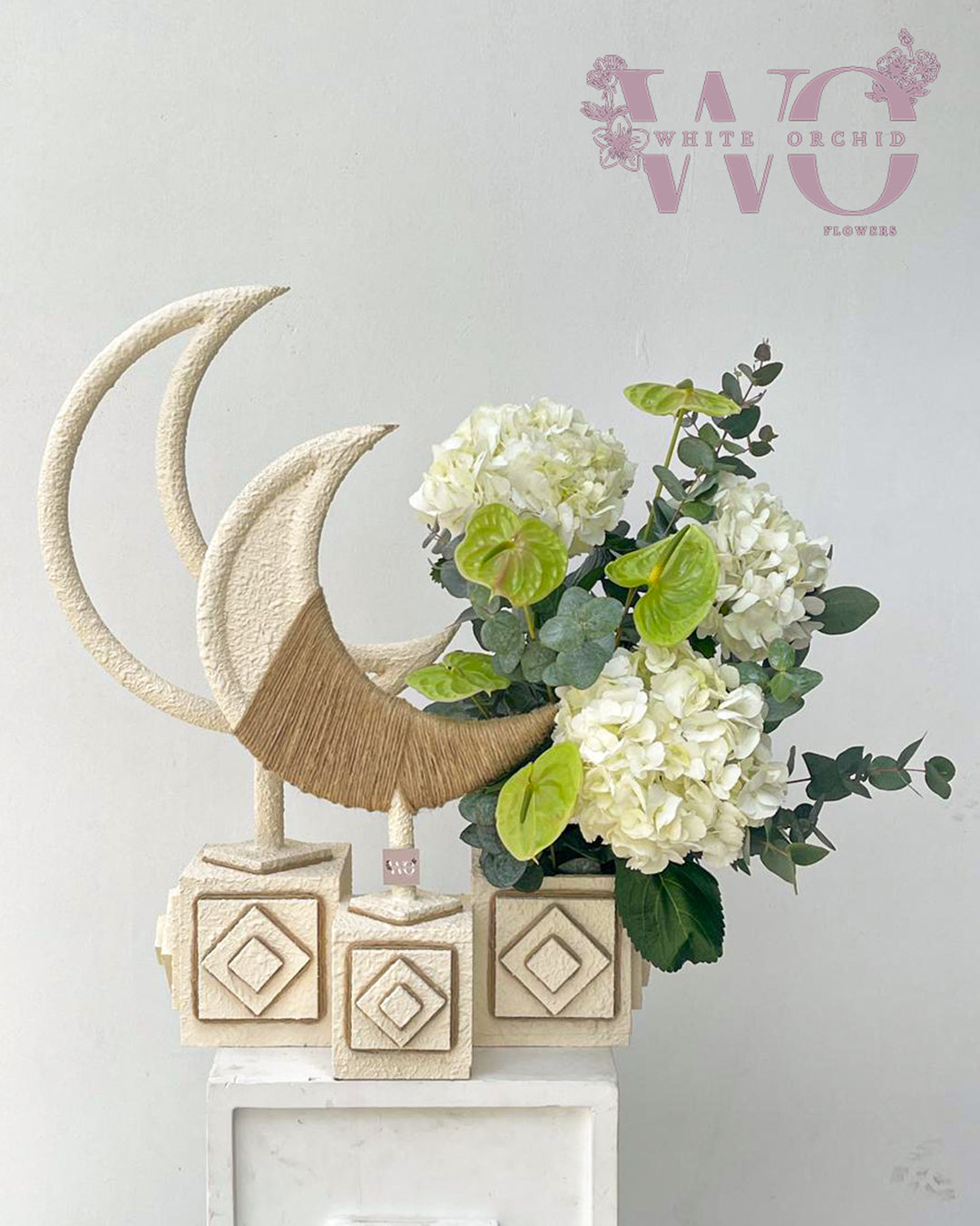 Ramadan flower arrangement made with natural fresh flowers by White Orchid Flowers with delivery across all UAE.
