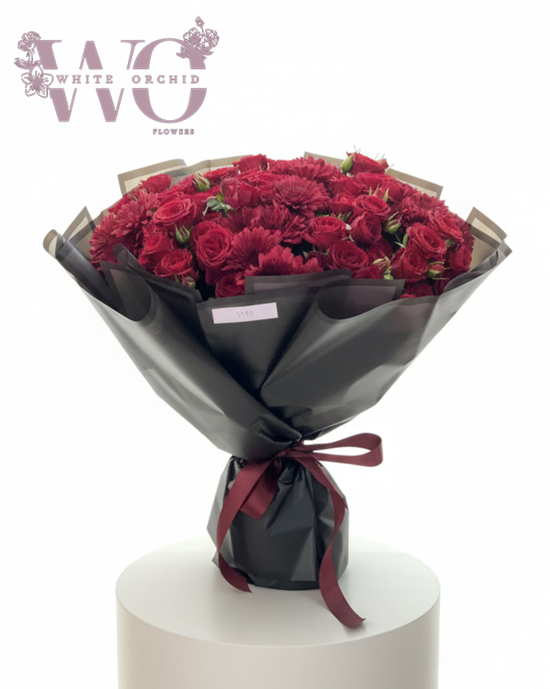 Valentine red baby rose hand bouquet made with natural fresh roses by White Orchid Flowers – romantic floral gift with delivery across all UAE.