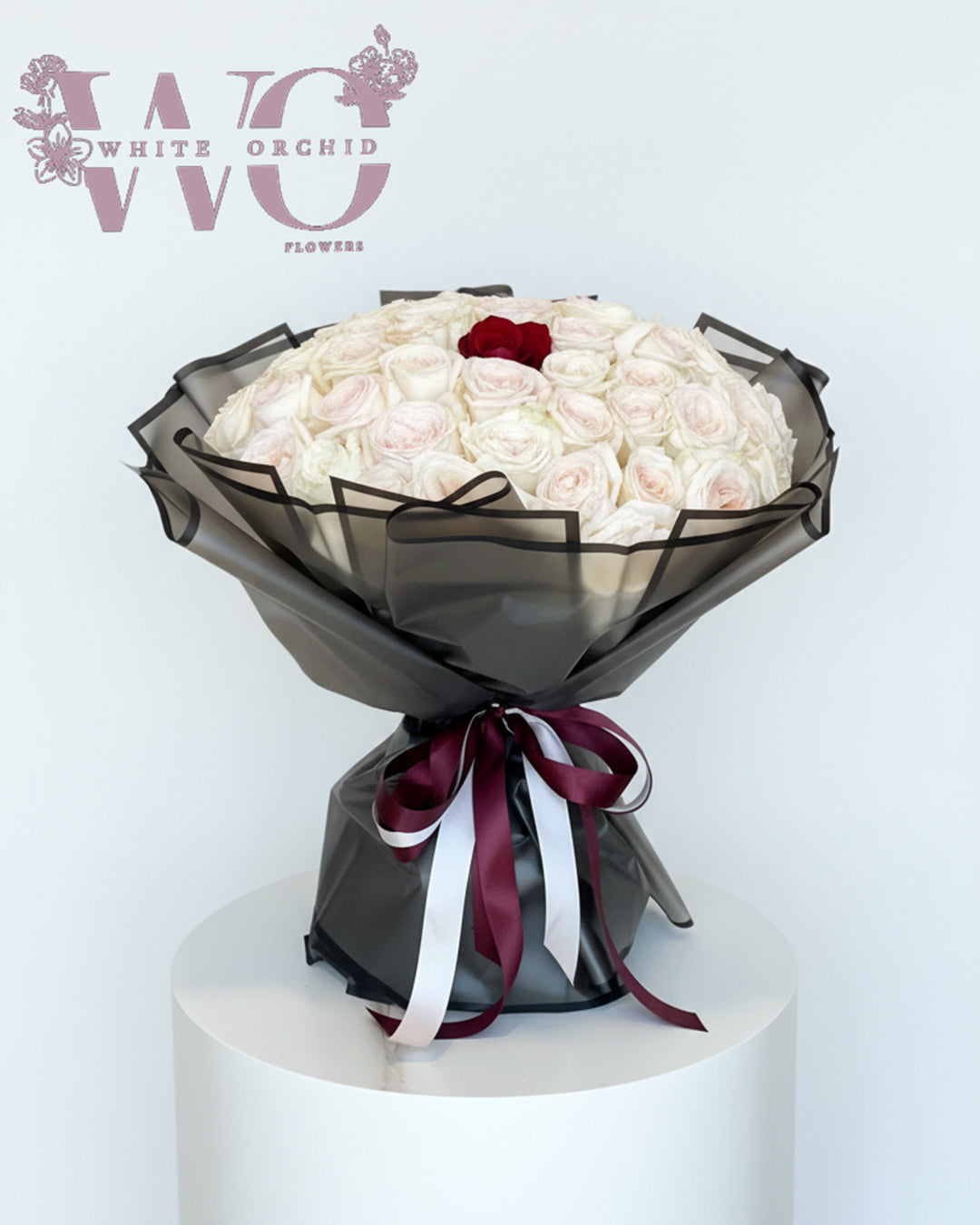 Valentine white O’Hara rose hand bouquet made with natural fresh roses by White Orchid Flowers – elegant romantic bouquet with delivery across all UAE.