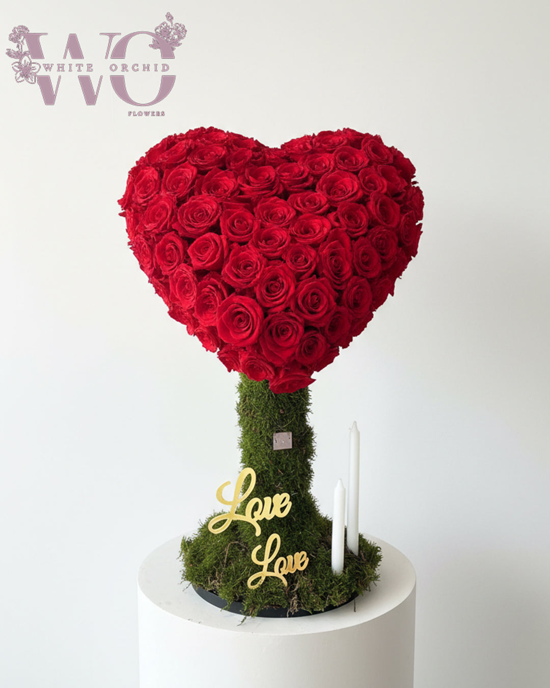 Valentine love heart-shaped flower bouquet made with natural fresh flowers by White Orchid Flowers – romantic floral gift with delivery across all UAE.