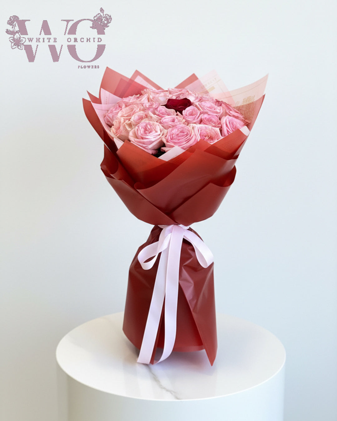 Valentine pink rose bouquet made with natural fresh roses by White Orchid Flowers – romantic floral gift with delivery across all UAE.