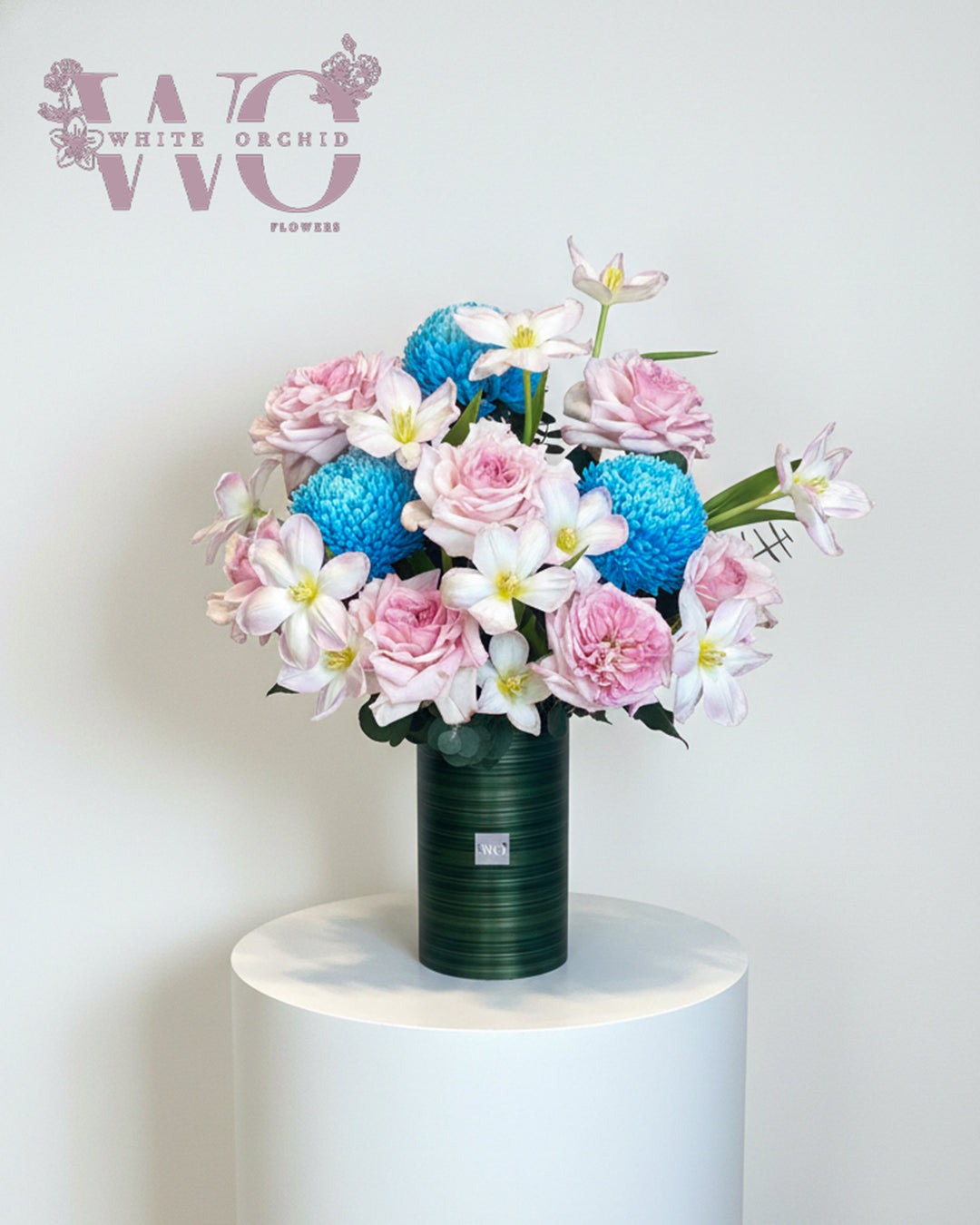 New baby boy flower bouquet made with natural fresh flowers by White Orchid Flowers – elegant newborn bouquet with delivery across all UAE.