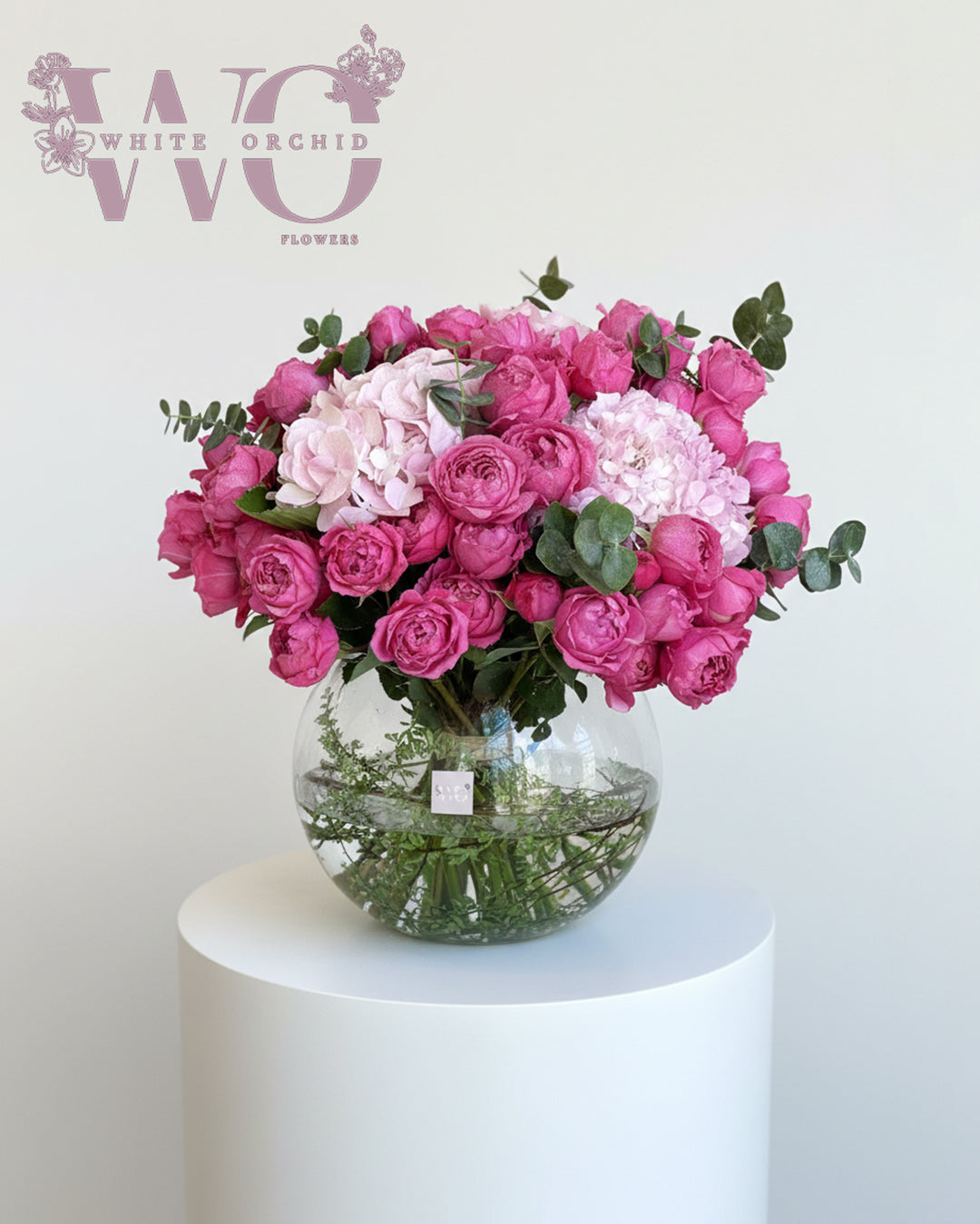 Valentine purple and pink flower bouquet made with natural fresh flowers by White Orchid Flowers – romantic floral gift with delivery across all UAE.