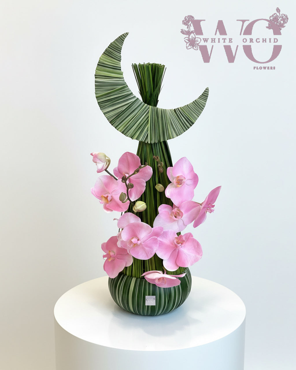 Ramadan crescent flower arrangement with pink orchids by White Orchid Flowers UAE.