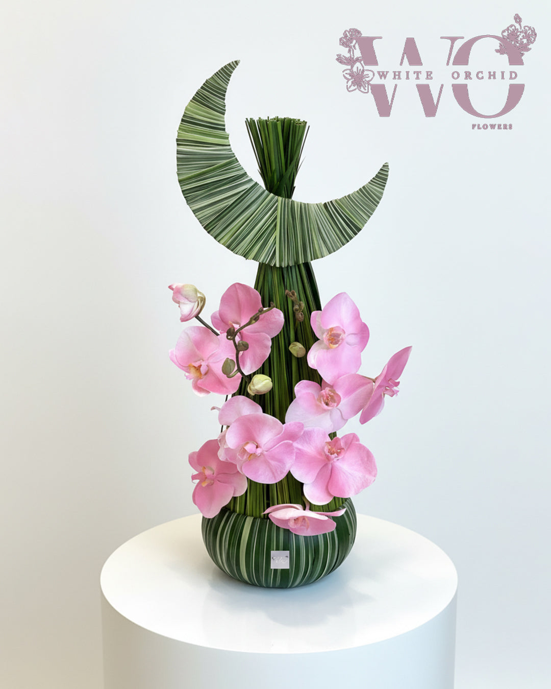 Ramadan crescent flower arrangement with pink orchids by White Orchid Flowers UAE.