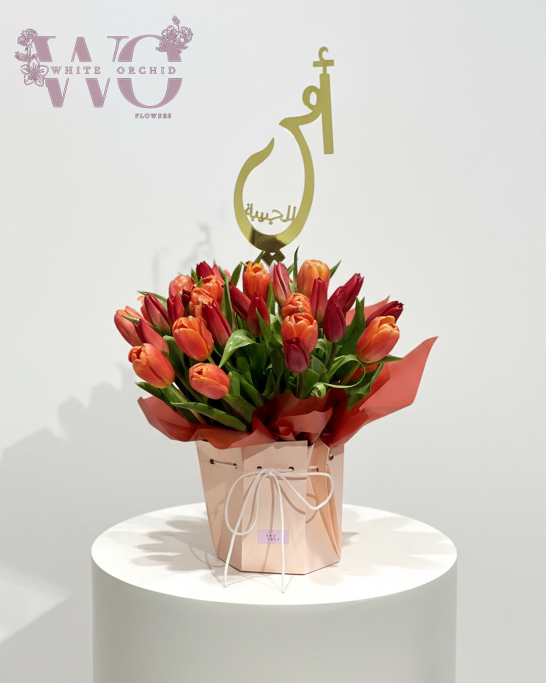 Mother’s Day tulip flower box with orange and red flowers by White Orchid Flowers UAE.